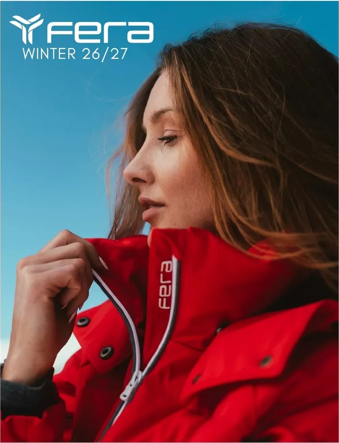 Profile portrait in a red Fera jacket against a blue sky, hair blowing in the wind, Fera Winter 26/27 cover